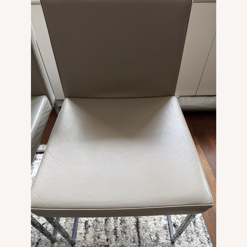 Used Calligaris Even Plus Light Gray Leather Dining Chairs for sale on AptDeco