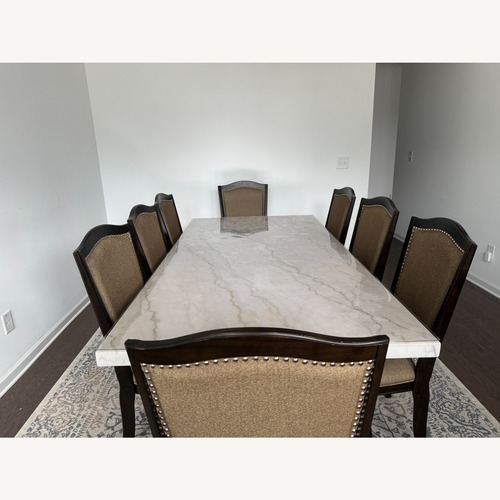 Used Dark Brown Marble Dining Set for sale on AptDeco