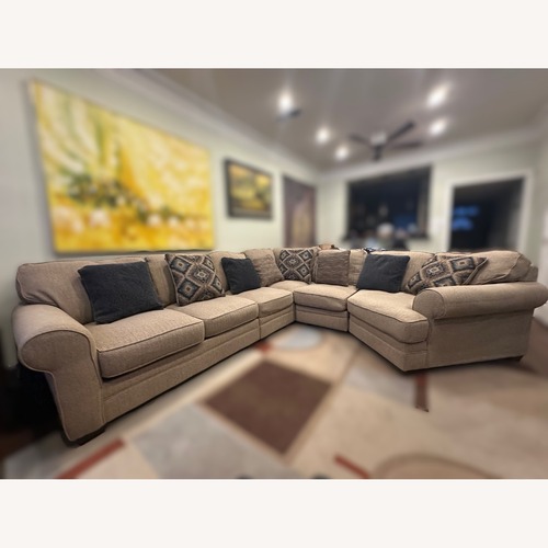 Used Ashley Furniture Beige Baceno Sectional for sale on AptDeco
