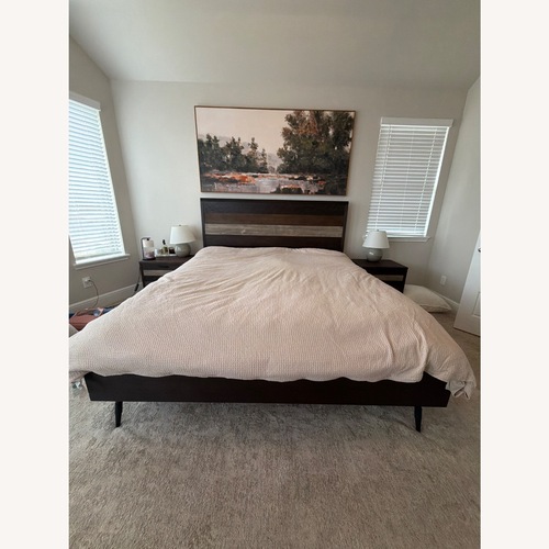 Used Rooms To Go  Dark Brown Wood King Bed for sale on AptDeco