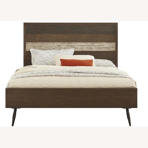 Used Rooms To Go  Dark Brown Wood King Bed for sale on AptDeco