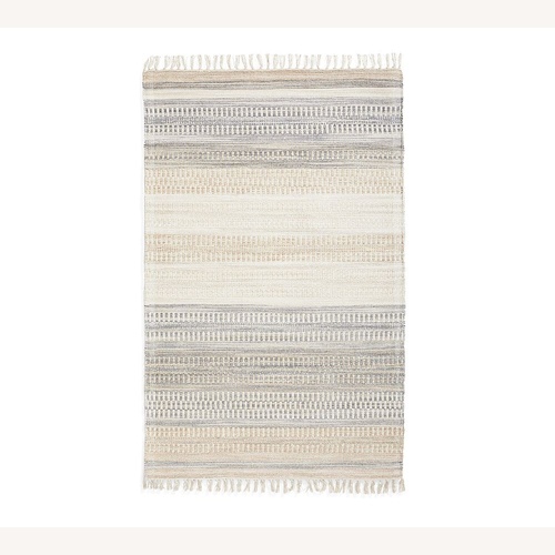 Used Pottery Barn Marina Flatweave Rug 8' x 10' for sale on AptDeco