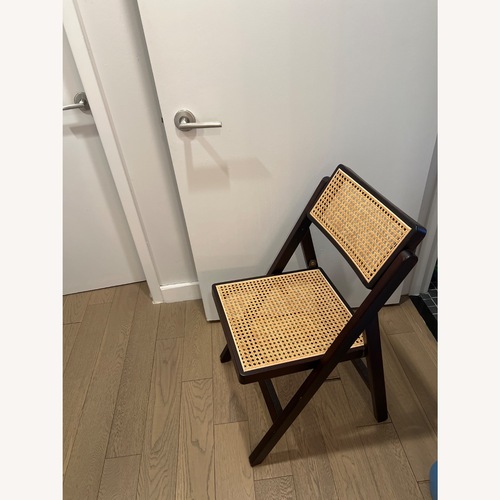 Used Dark Brown Rattan Dining Chairs for sale on AptDeco