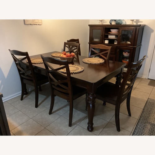 Used Ashley Furniture Rustic Brown Wood Dining Set for sale on AptDeco