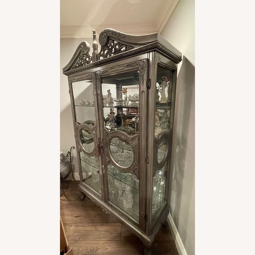 Used Silver Wooden Curio Cabinet  for sale on AptDeco