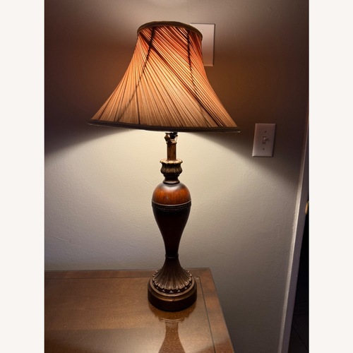 Used Vintage/Antique Dark Brown Wood Table Lamp for sale on AptDeco