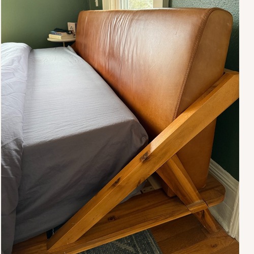 Used CB2 Drommen Light Brown Wood and Leather King Bed for sale on AptDeco