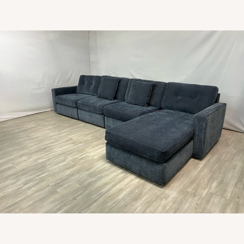 Used Raymour and Flanigan Modular Sectional and Chaise for sale on AptDeco