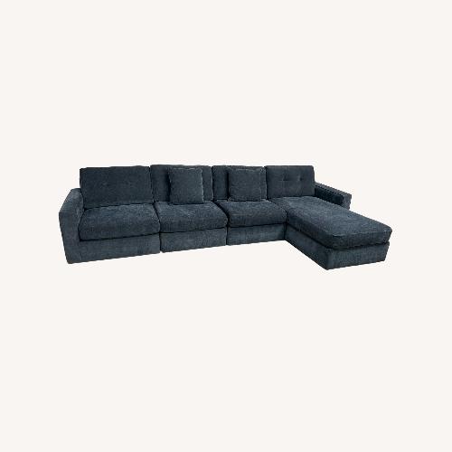 Used Raymour and Flanigan Modular Sectional and Chaise for sale on AptDeco