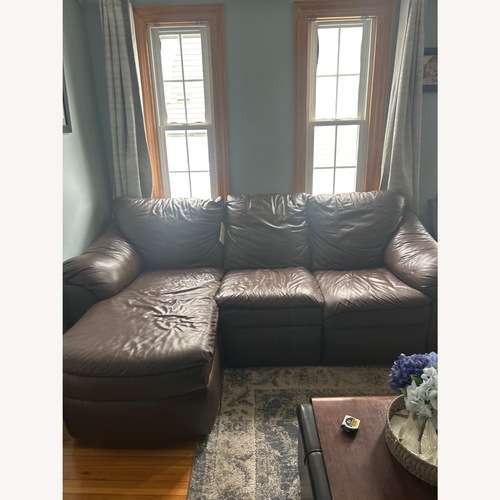 Used Dark Brown Leather 3+ Piece Sectional for sale on AptDeco