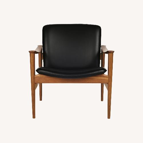 Used Saarinen & Eames  Modell 711 Black Leather Armchairs for sale on AptDeco
