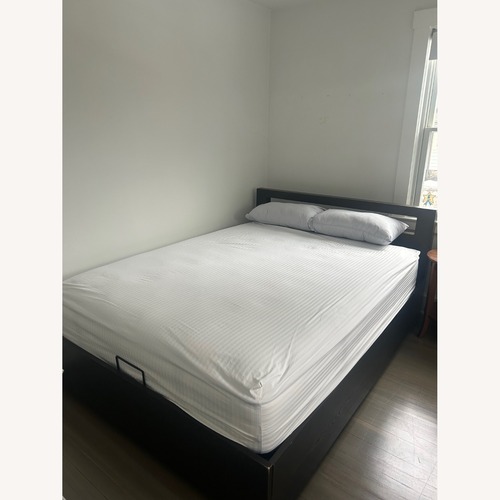 Used West Elm Emmett Pop up Storage Queen Bed  for sale on AptDeco