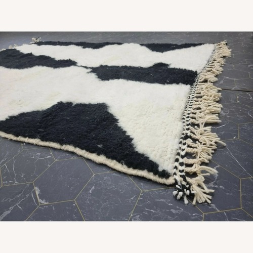 Used Black & White Geometric Wool Area Rug 5' x 7' for sale on AptDeco