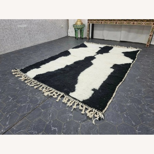 Used Black & White Geometric Wool Area Rug 5' x 7' for sale on AptDeco