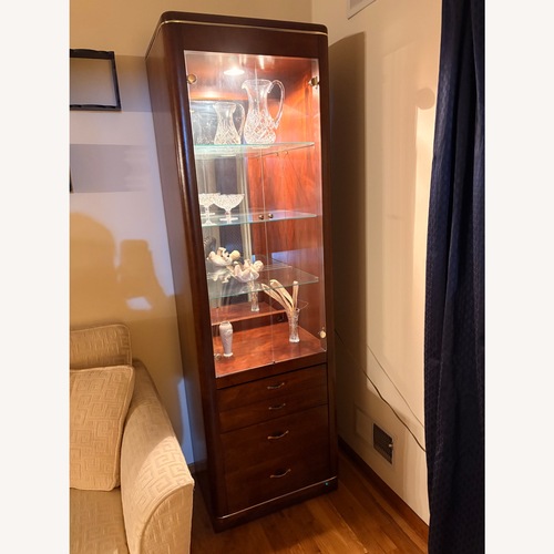 Used 2 Curio Cabinets for sale on AptDeco