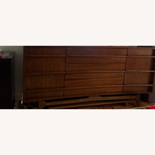Used Dark Brown Wood Armoire for sale on AptDeco