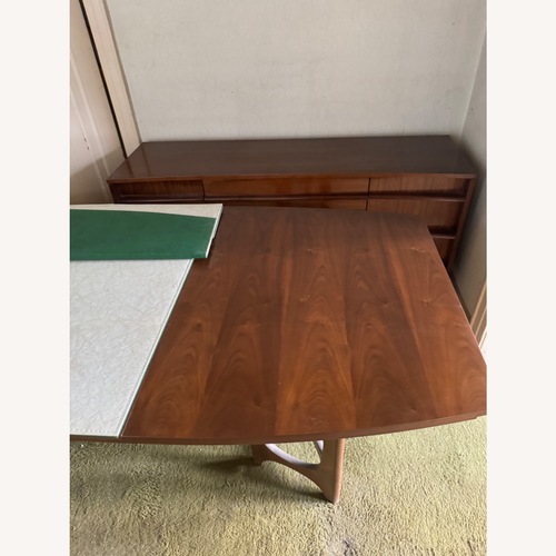 Used Vintage/Antique Dark Brown Dining Table for sale on AptDeco