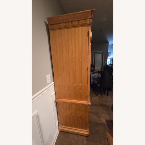 Used Natural Wood Armoire for sale on AptDeco