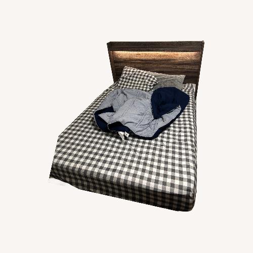 Used Dark Brown Wood Headboard for sale on AptDeco