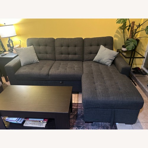 Used Raymour & Flanigan Dark Gray 2 Piece Sectional for sale on AptDeco