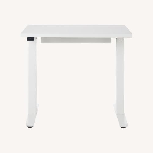 Used Herman Miller Motia Sit/Stand White Desk for sale on AptDeco