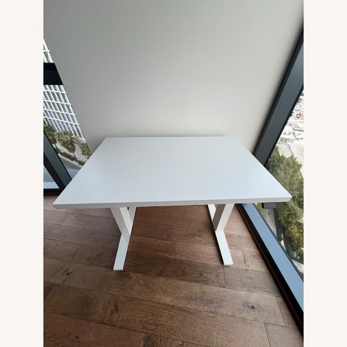 Used Herman Miller Motia Sit/Stand White Desk for sale on AptDeco