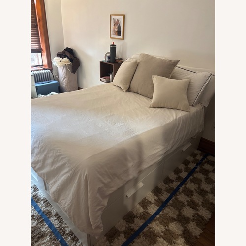 Used IKEA Brimnes White Wood Full Bed for sale on AptDeco