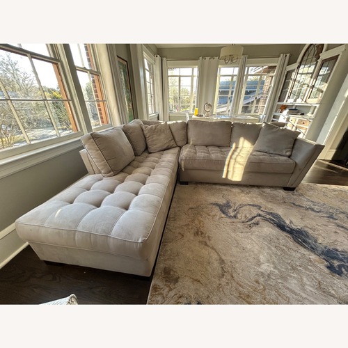 Used Rooms To Go Light Gray 2 Piece Sectional for sale on AptDeco