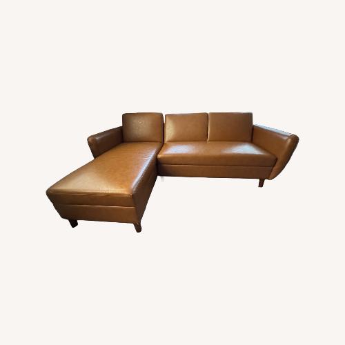 Used Modern Reversible Sectional in Faux Air Leather for sale on AptDeco