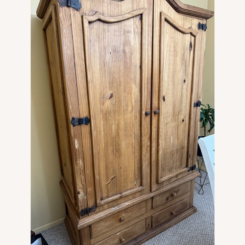 Used Natural Wood Armoire for sale on AptDeco