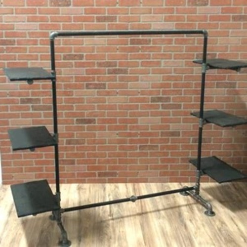 Used Industrial Pipe Garment Rack w Wood Shelves for sale on AptDeco