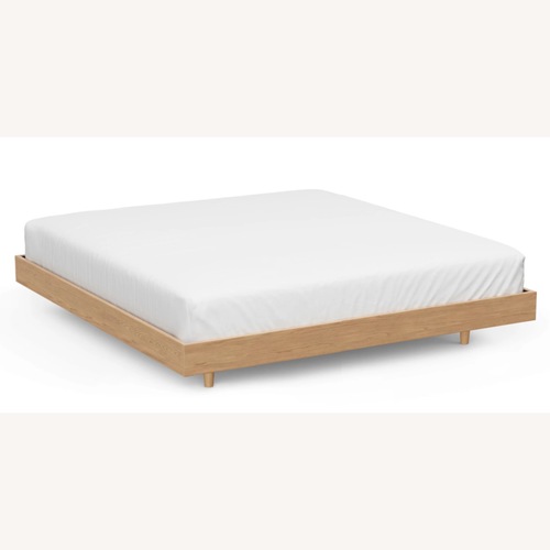 Used Article Basi King Bed Frame for sale on AptDeco