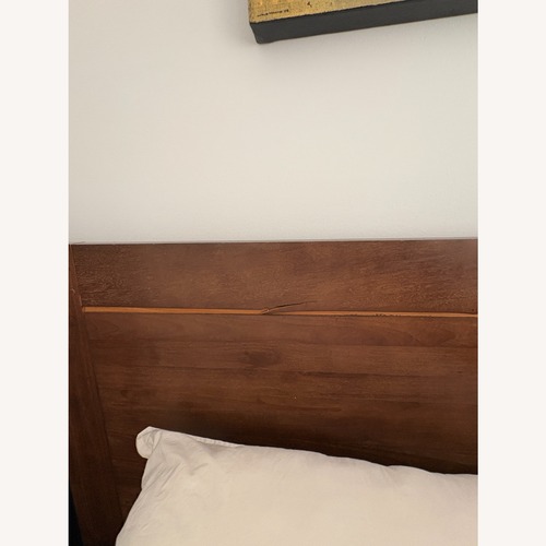 Used Bloomingdale's Dark Brown Wood Queen Bed for sale on AptDeco