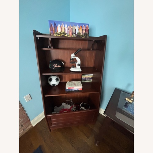 Used Pottery Barn Kids Dark Brown Bookcase for sale on AptDeco