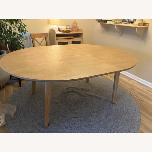 Used Article Plumas Natural Wood Dining Table  for sale on AptDeco