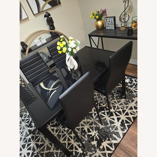 Used Black Glass Dining Set for sale on AptDeco
