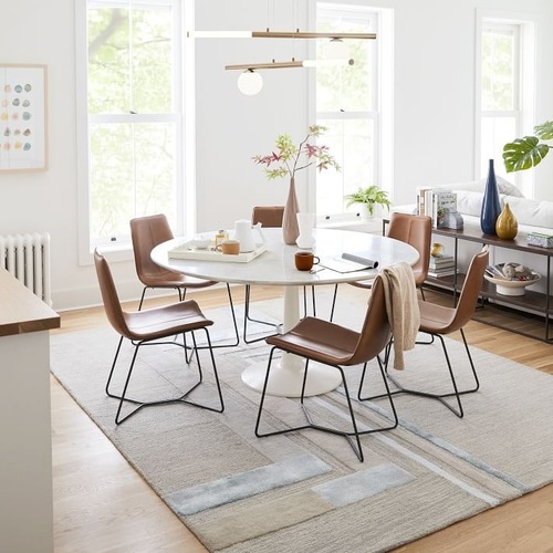 Used West Elm Slope Leather Dining Chair for sale on AptDeco