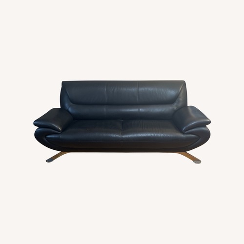 Used Raymour & Flanigan Black Leather Sofa for sale on AptDeco
