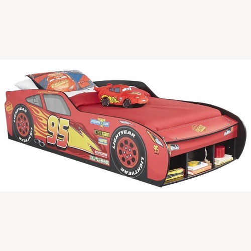 Used Rooms To Go Red Wood Twin Bed for sale on AptDeco