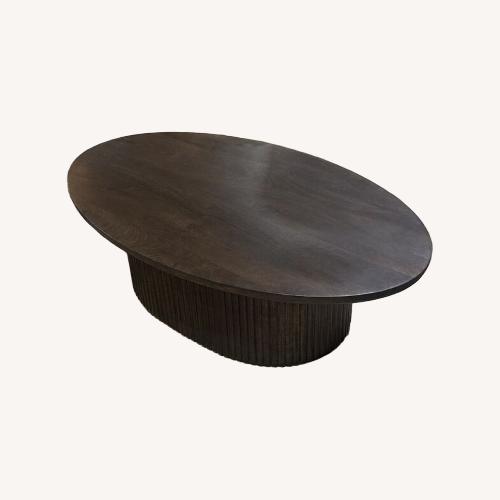 Used Terra Oval Fluted Lift-Top Coffee Table for sale on AptDeco