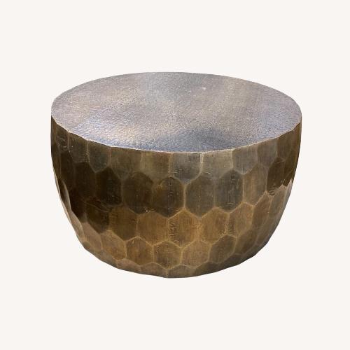 Used Pottery Barn Vince Metal-Clad Round Coffee Table for sale on AptDeco