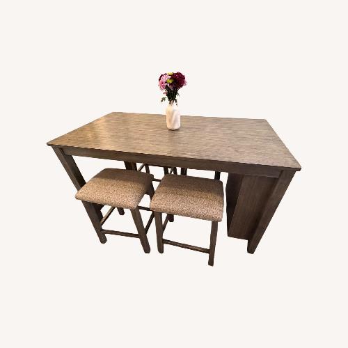 Used Ashley Furniture Dark Gray Wood Dining Sets for sale on AptDeco