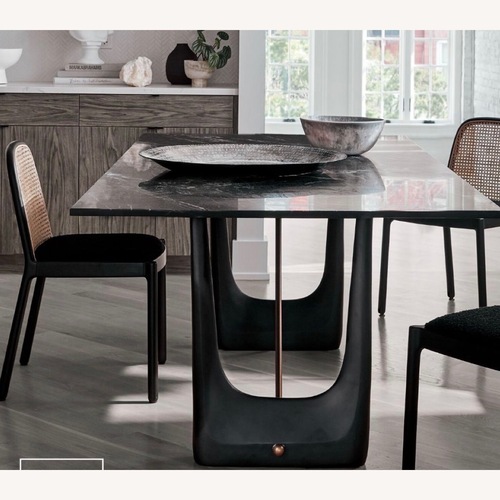 Used CB2 Caleb Zipperer Black Marble Dining Table for sale on AptDeco