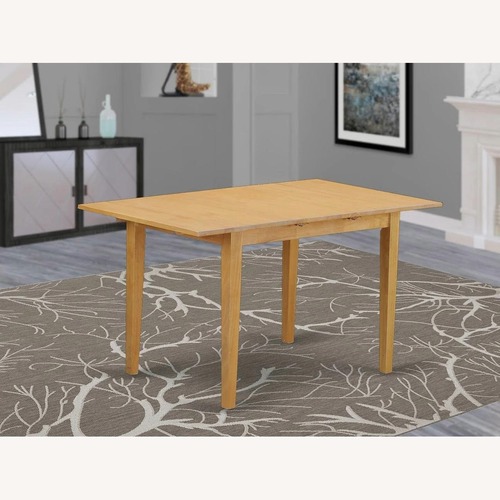 Used Extendable Oak Solid Wood Dining Table for sale on AptDeco