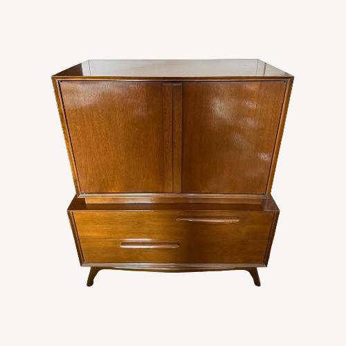 Used Antique Dark Brown Wood Armoire for sale on AptDeco