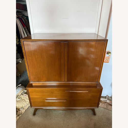 Used Antique Dark Brown Wood Armoire for sale on AptDeco