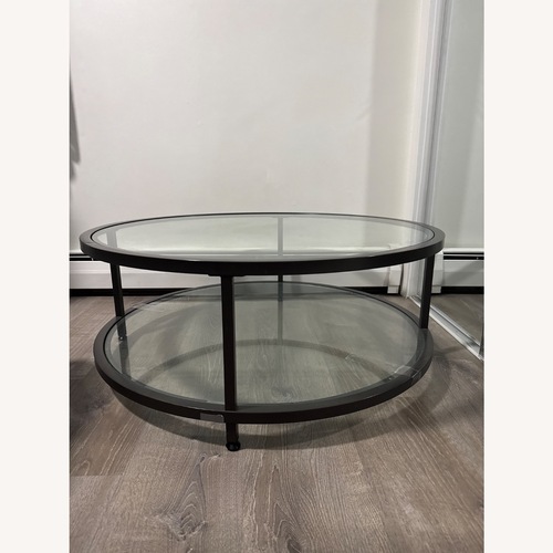 Used Amazon Modern Circular Glass Coffee Table for sale on AptDeco