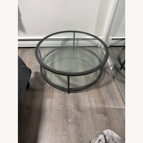 Used Amazon Modern Circular Glass Coffee Table for sale on AptDeco
