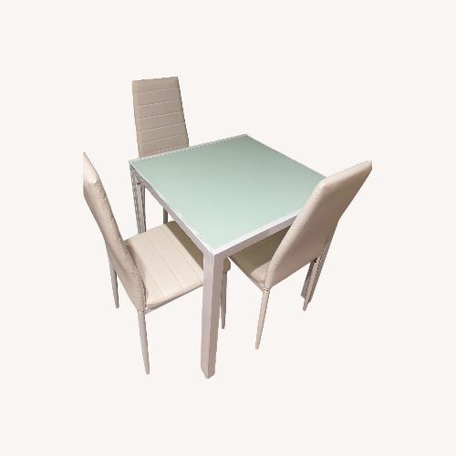 Used White Glass Dining Table for sale on AptDeco