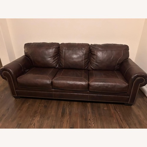 Used Ashley Dark Brown Leather Sofas Quantity 2 for sale on AptDeco